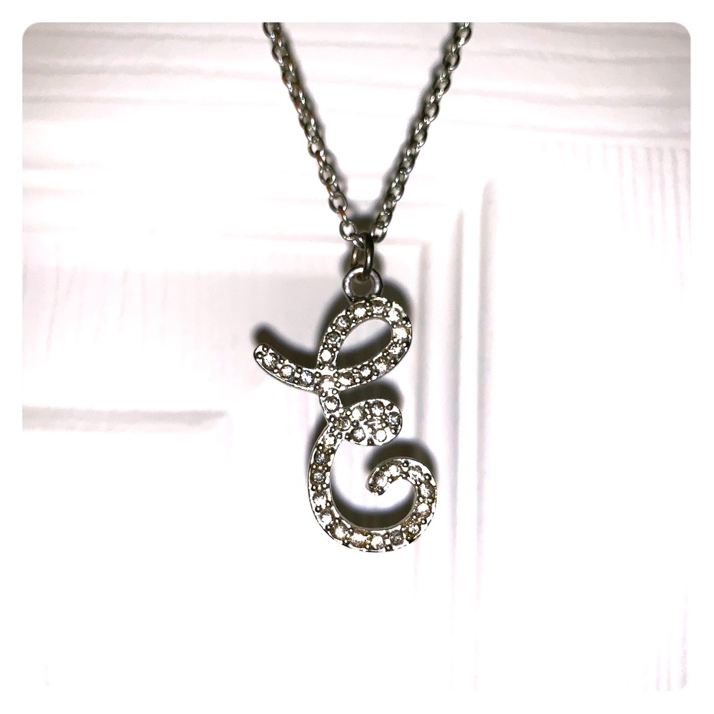 Claire’s silver cursive E pendant necklace